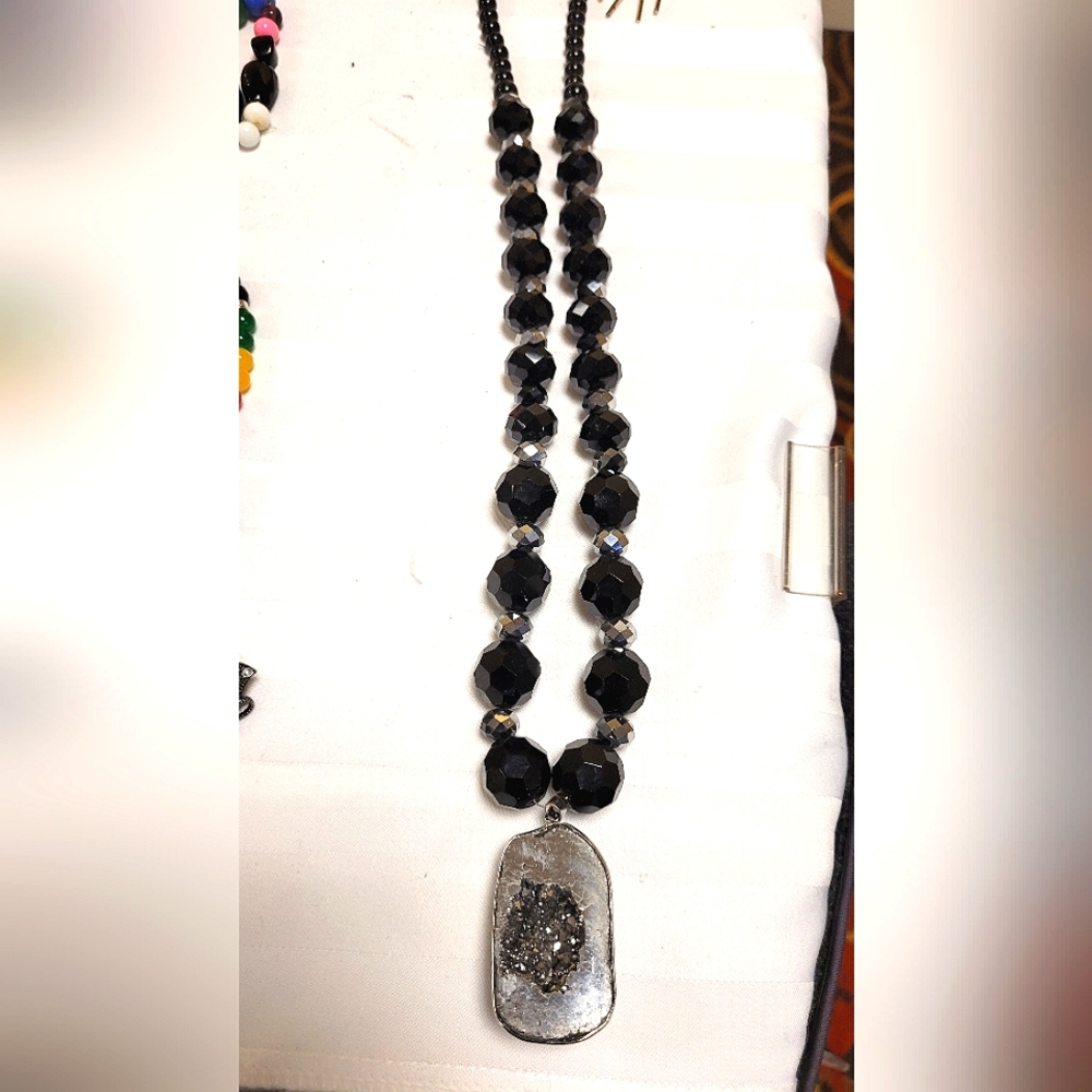 Large black beads with crystallized pendant